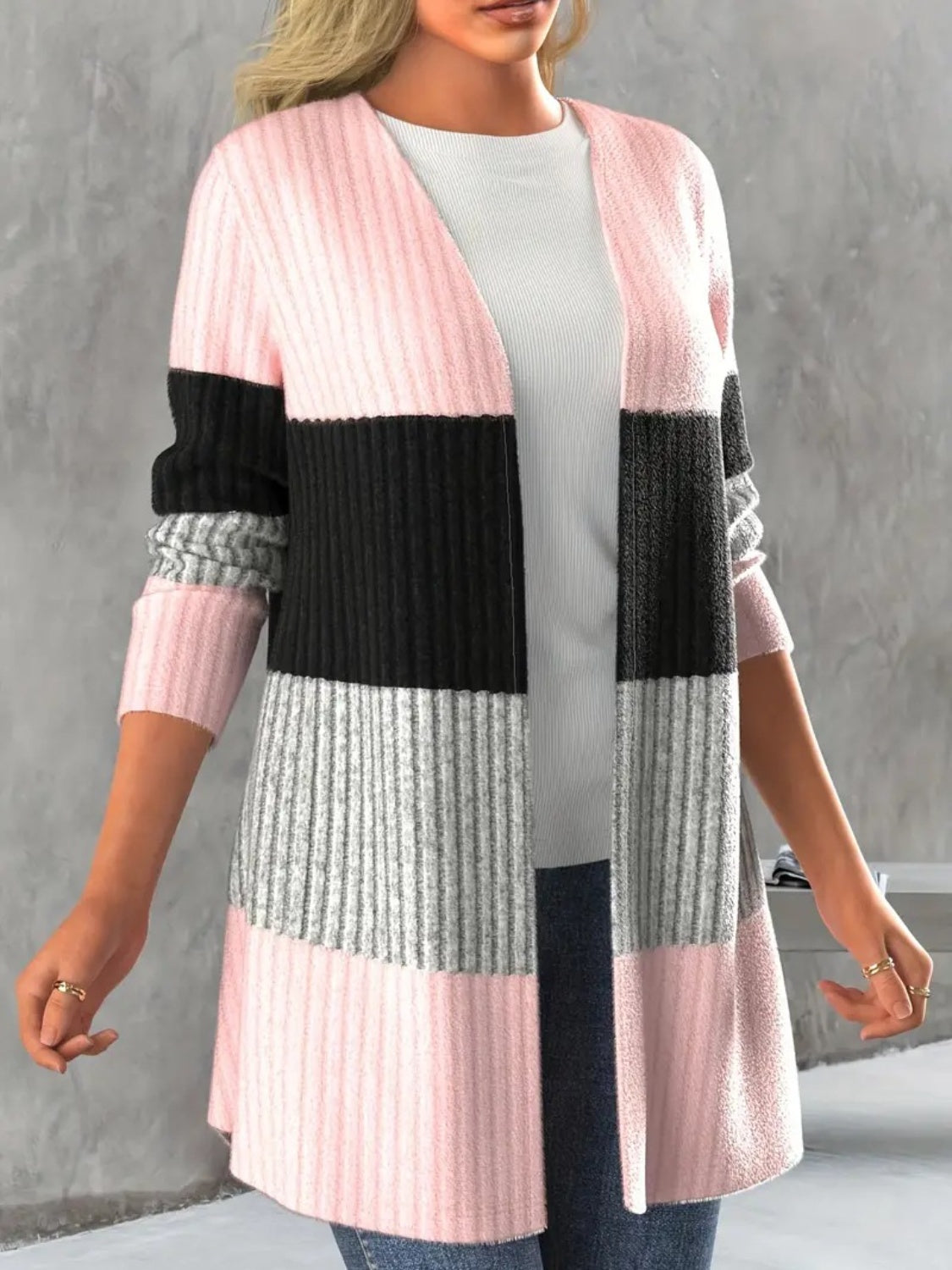 Long ribbed cardigan in blush pink, black, and grey colorblock.