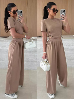 Mocha crop top and wide-leg pants set with adjustable side ties and drawstring waist.