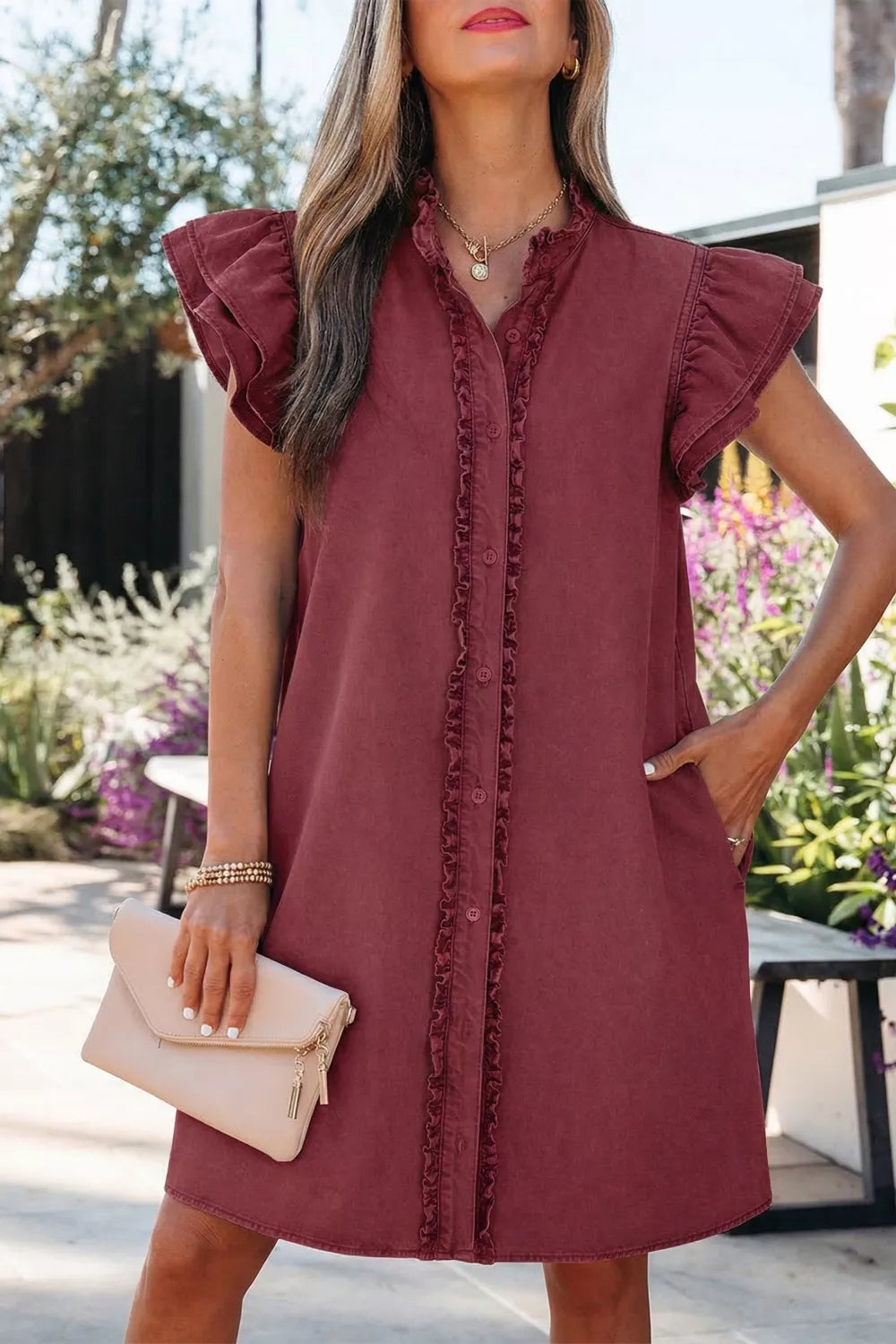Ruffled button-down denim mini dress with flutter sleeves and a collared neckline in a deep red hue.