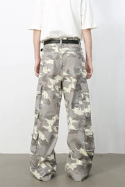 Urban Warrior cargo jeans in gray camouflage print with multiple pockets and a relaxed fit.