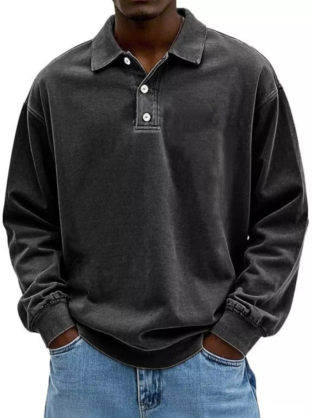 Men's vintage washed long sleeve polo shirt in dark grey cotton with buttoned placket.