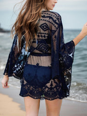 Navy lace kimono beach cover-up with bell sleeves and intricate embroidery.