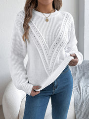 White chevron knit sweater with openwork detail and crew neck.