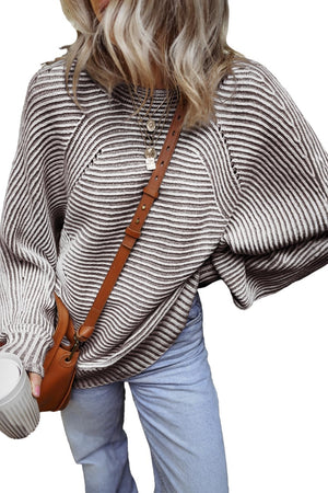Textured stripe batwing knit sweater in taupe and white with a relaxed fit.