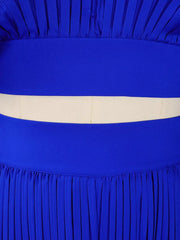 Blue pleated two-piece set with a cream waistband detail and wide legs.
