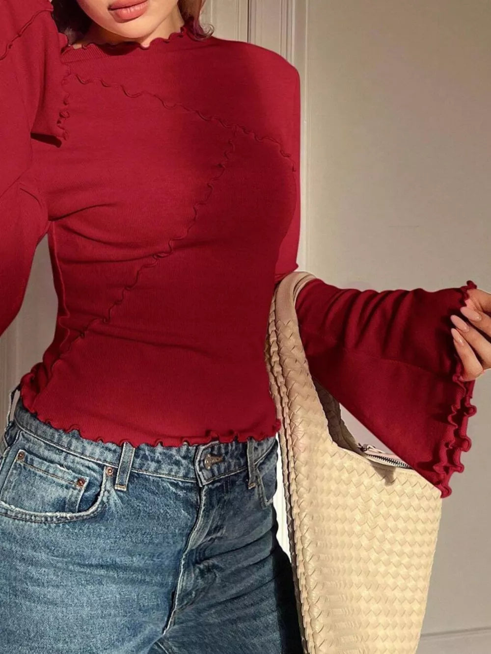 Red lettuce edge flare sleeve t-shirt with lettuce edge hem and cuffs.