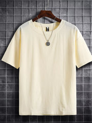 Beige cotton crew neck t-shirt with short sleeves and a relaxed fit.
