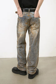 Relaxed fit acid wash denim jeans in medium blue with a distressed look.