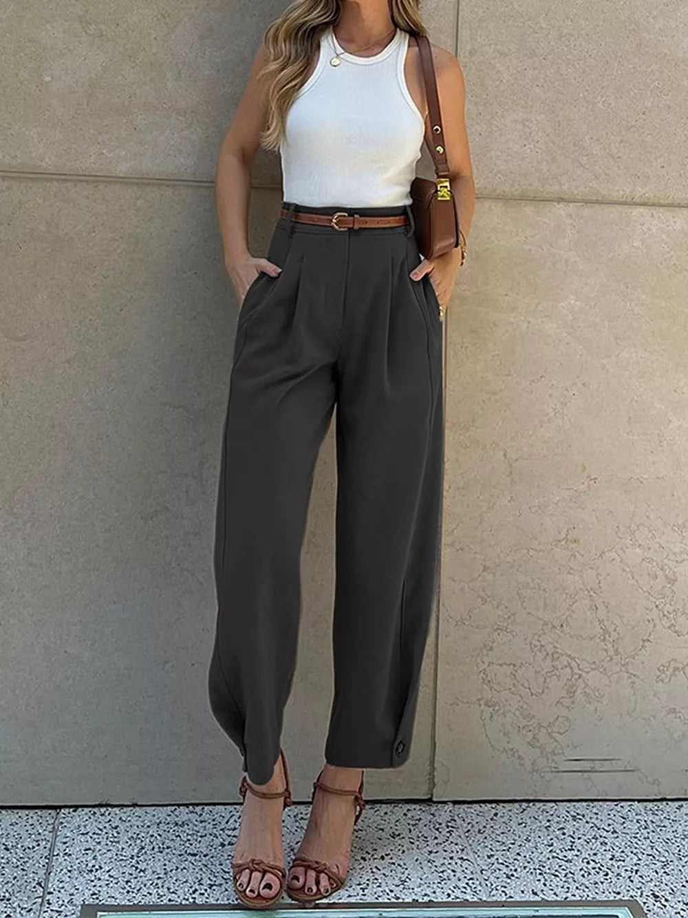 High-waisted Pleated Pants in Brown, model styling view