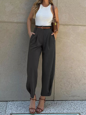 High-waisted Pleated Pants in Brown, model styling view