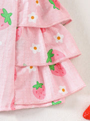 Pink cotton cami set with strawberry and flower print, featuring tiered ruffles.