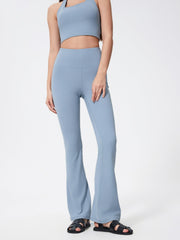 Flared sculpt leggings in light blue with a high-rise waist and a subtle flare at the hem.