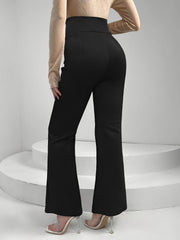 Black flare trousers with lace-up waist detail and high rise.
