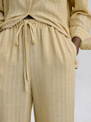 Chic striped two-piece set with drawstring waist pants and button-down shirt.