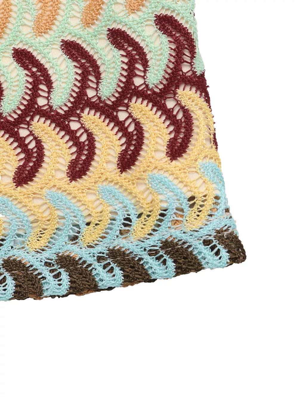 Crochet mini skirt with colorful wavy pattern and open knit detail.