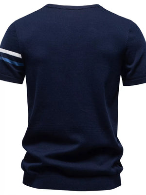 Navy cotton t-shirt with white and blue striped sleeves.