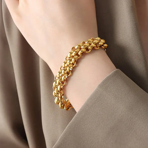 Gold triple-strand chain bracelet with interlocking links, 18K gold-plated