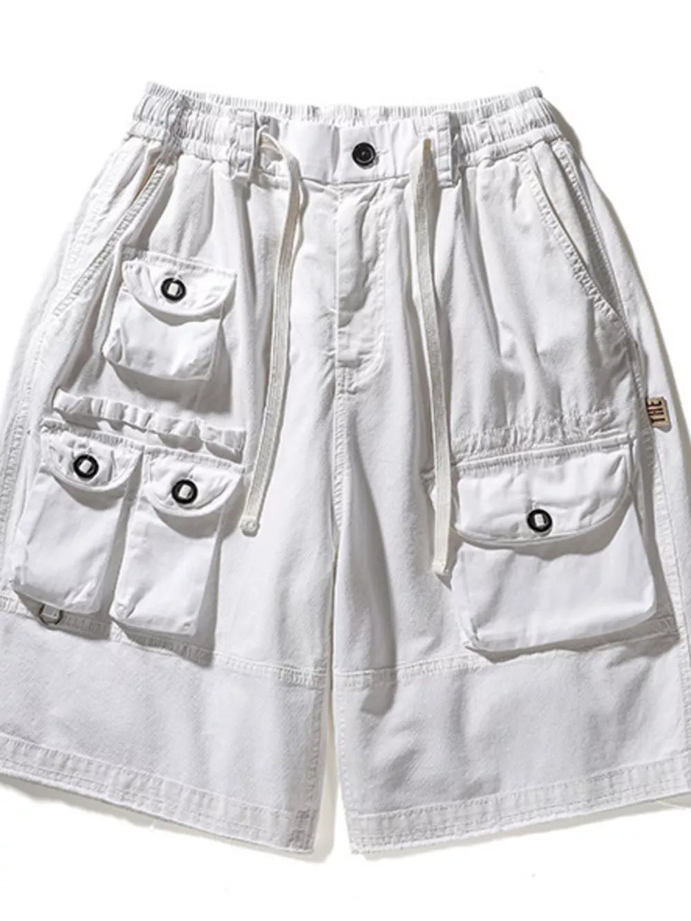 White men's cargo shorts with multiple pockets and drawstring waist.