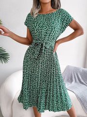 Green floral print midi dress with tie waist and pleated skirt