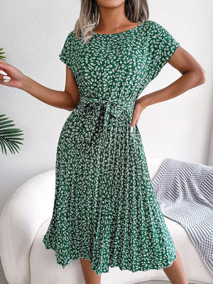 Green floral print midi dress with tie waist and pleated skirt