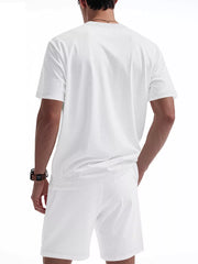 White waffle-knit two-piece pajama set with crew neck t-shirt and shorts.