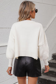 White cropped dolman sleeve knit sweater with ribbed cuffs and hem