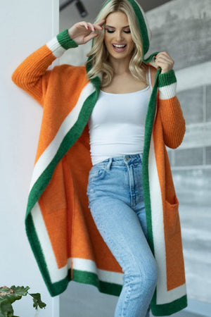 Color-blocked hooded knit maxi cardigan in orange with green and white trim, featuring pockets.