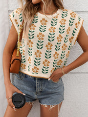 Floral knit sleeveless top in beige with brown and green floral pattern.