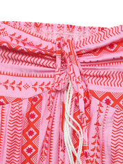 Pink halter neck midi dress with red geometric print and drawstring detail