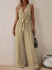 Tan textured wrap-front wide-leg jumpsuit with tie waist and V-neck
