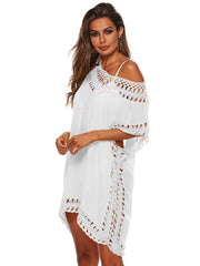 White crochet trimmed kaftan cover-up with off-the-shoulder neckline and short sleeves.