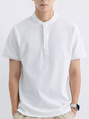 White short sleeve t-shirt with mandarin collar and button placket, cotton blend.