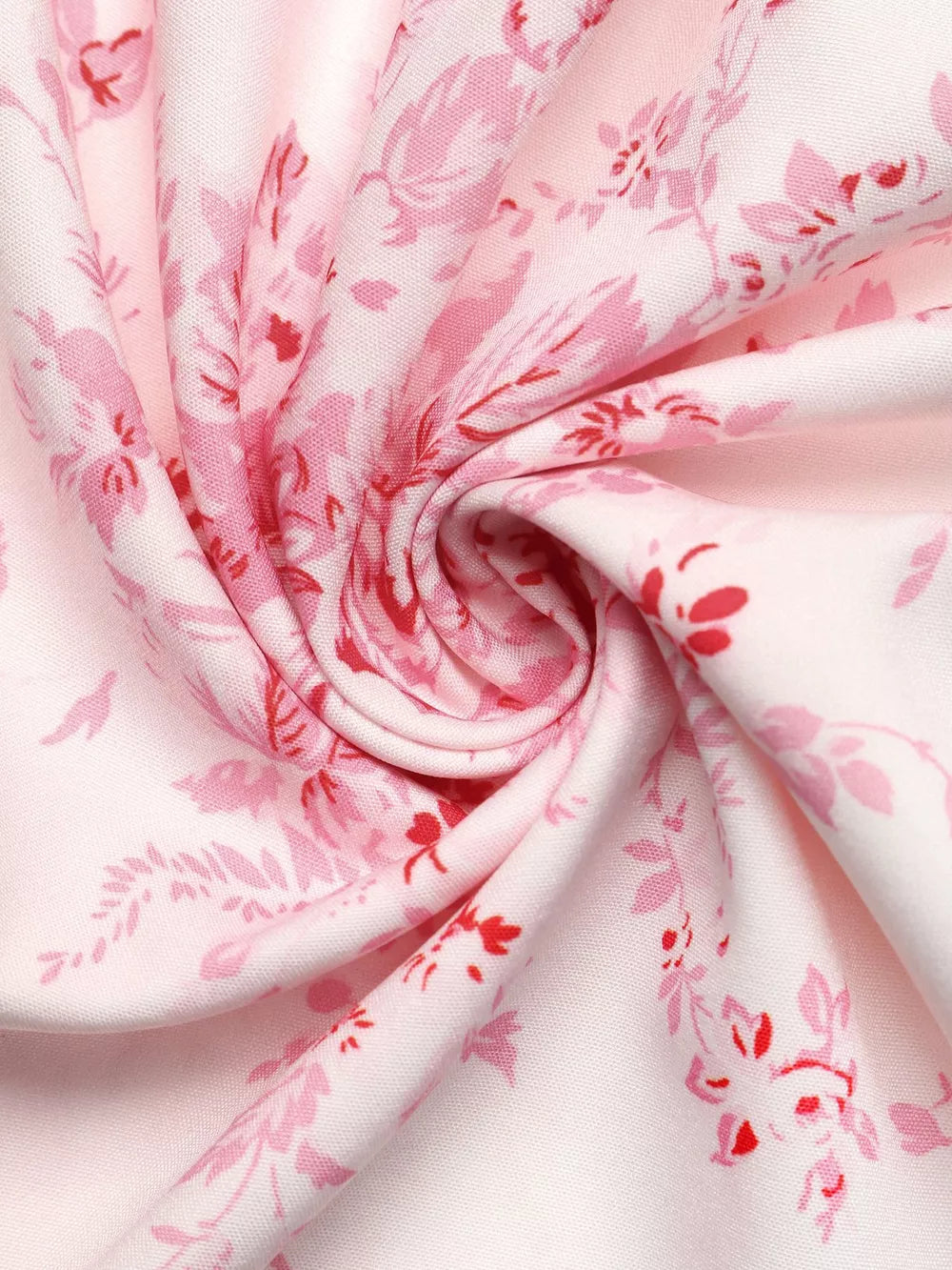 Romantic floral cami dress in pink with a delicate floral print and frill detail.