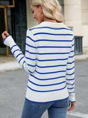 Polo-neck knit top with blue and white Breton stripes, long sleeves, and ribbed cuffs.