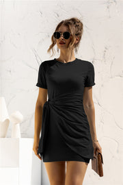Black jersey mini dress with short sleeves and a knot-front detail