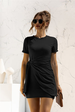 Black jersey mini dress with short sleeves and a knot-front detail
