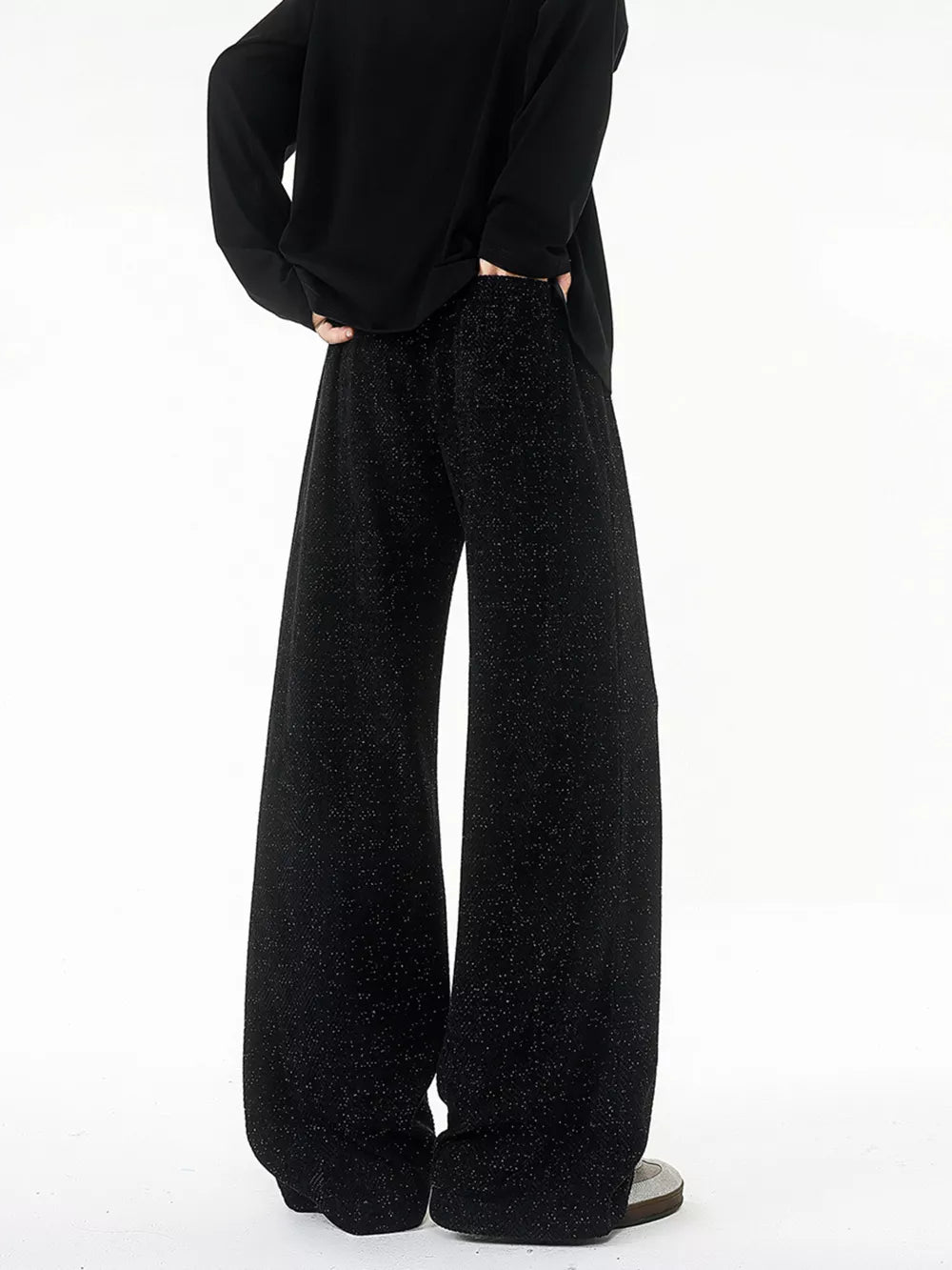 Black textured knit sweatpants with a wide leg and subtle sparkle detail.