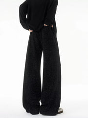 Black textured knit sweatpants with a wide leg and subtle sparkle detail.