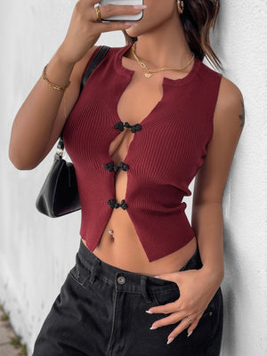 Burgundy ribbed knit crop top with button-up closure and cut-out neckline.