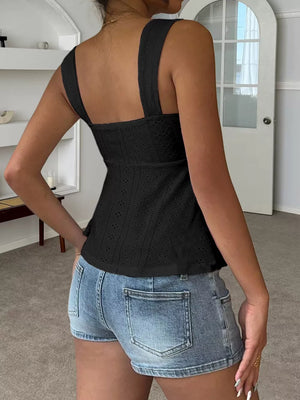 Black eyelet cami with square neckline and wide straps, paired with denim shorts.
