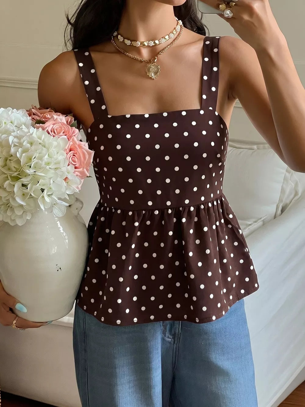 Brown polka dot camisole with square neckline and peplum hem