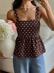 Brown polka dot camisole with square neckline and peplum hem