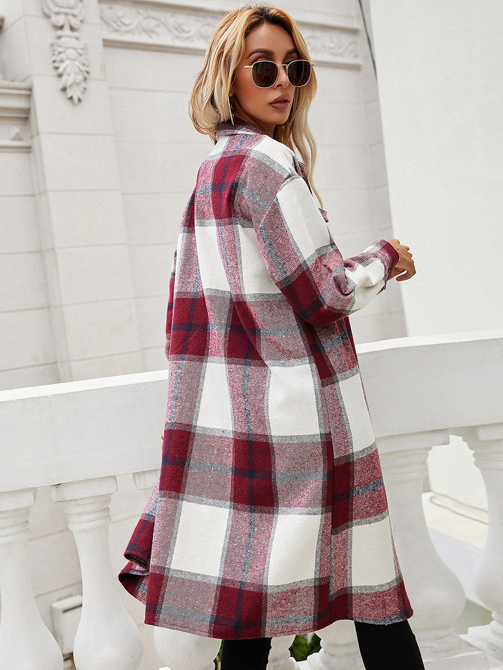 Burgundy plaid duster shirt jacket with a relaxed fit and long sleeves.