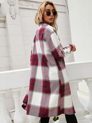 Burgundy plaid duster shirt jacket with a relaxed fit and long sleeves.