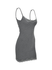 Grey lace trim bodycon mini dress with spaghetti straps and lace hem.