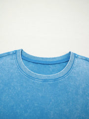Mineral washed blue cotton crew neck t-shirt with a relaxed fit.