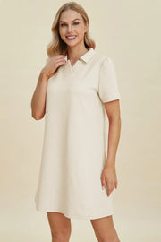 Ivory textured V-neck short sleeve mini dress with geometric pattern