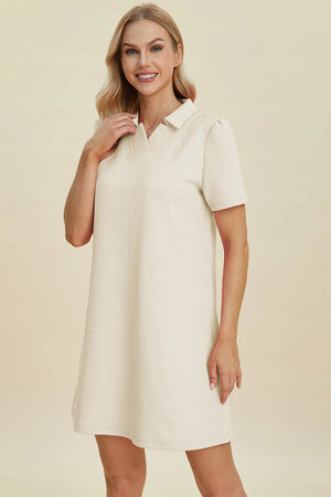 Ivory textured V-neck short sleeve mini dress with geometric pattern