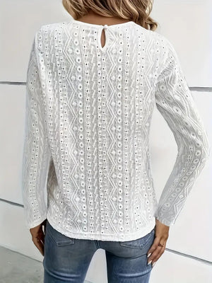 White eyelet embroidered blouse with lace yoke detail and keyhole back.