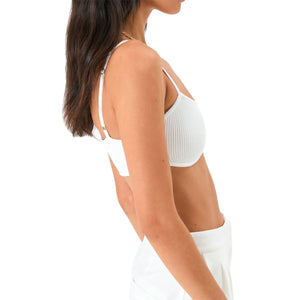 White ribbed knit bustier bra with delicate adjustable straps and a sweetheart neckline.